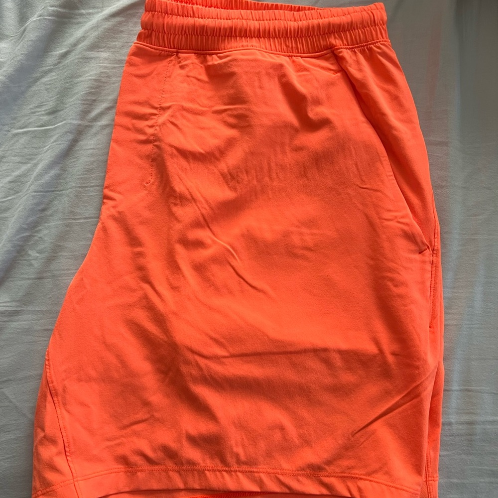 Lululemon Pace Breaker linerless 7 inch inseam XXL - Highlighter Orange